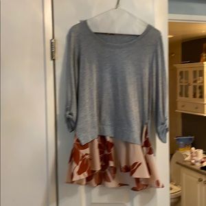 You will love this fitted yet covered sweater